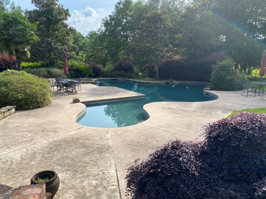 Before renovation picture of a pool in Bush.