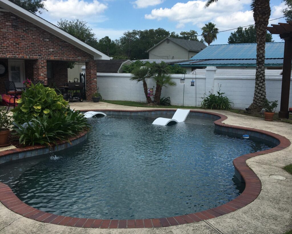 Before renovation picture of a pool in Laplace.